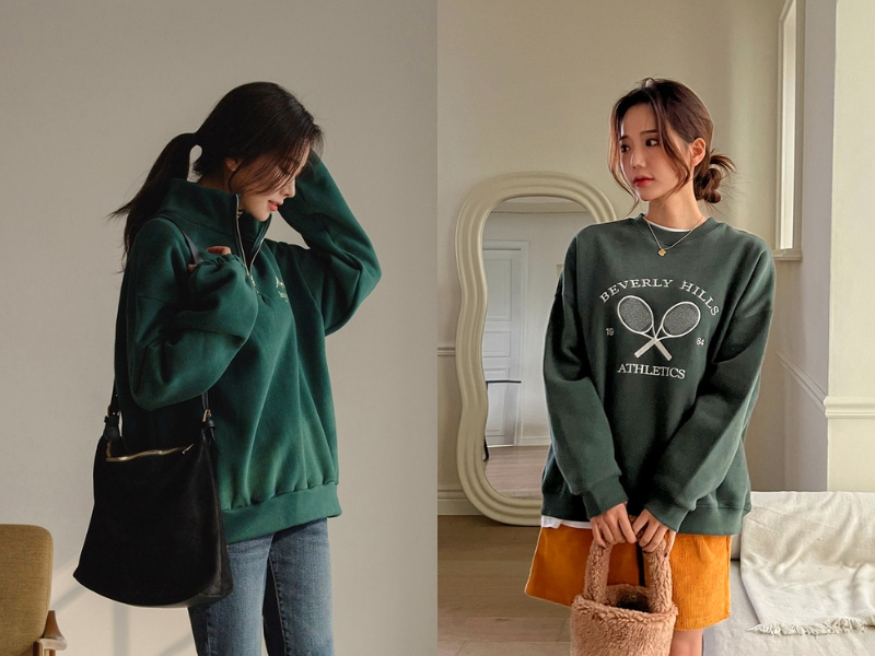 Nữ da ngăm đen nên mặc áo màu gì vào mùa đông? Áo sweater màu xanh rêu nền nã cho ngày đông ấm áp bạn nhé! (Nguồn: Kooding)